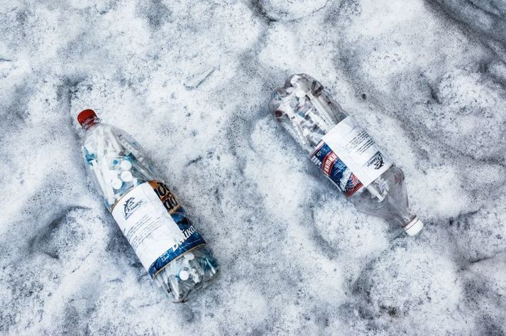 Plastic bottles full of used syringes and needles collected by outreach workers from drug users in 2011 in exchange for clean needles and wet wipes. Ukraine, 2011.
